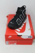 A pair of youths as new Nike Air More Uptempo (UK 5.5).