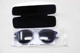 A pair of as new Calvin Klein sunglasses.