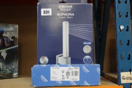 A Grohe Lineare Basin Mixer and a Grohe Cube+ Stick.