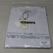 An as new unisex Vetements The Logo T-shirt in white (S).