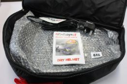 An as new Capit helmet dryer for effective drying of the inside of motorcycle helmets.