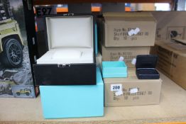 Six as new Tiffany & Co watch cases/boxes and a quantity of earring cases.