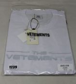 An as new unisex Vetements The Logo T-shirt in white (XXL).