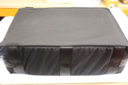 An as new Brass Bags Quad musical instrument case.