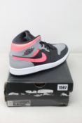 A pair of as new Nike Air Jordan 1 Mid (UK 10).