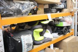 A quantity of assorted pushchairs, car seats and related items.