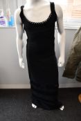 An as new Herve Leger dress in black (XXS - No tag but Herve Leger return label still attached).