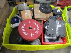 A large quantity of weights, kettle bells and related items.