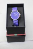 A women's as new Coluri Kahlo watch in violet (RRP £139).
