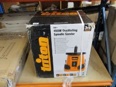 A boxed as new Triton 450w oscillating spindle sander (TSPS450).