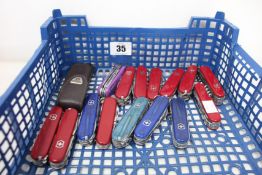 Sixteen Victorinox multi-tools and related multi-tools (Over 18s only).