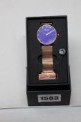 A women's as new Coluri Kahlo watch in violet (RRP £139).