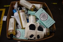 A box of as new luxury beauty and skin care items and related.