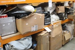 A large quantity of car parts and related items.