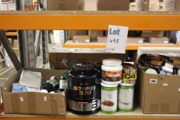 A quantity of supplements, protein powder and other related items.