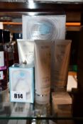 A boxed as new Ageloc NU Skin Lumispa (Slight damage to outer box) and three Nu Skin Lumispa