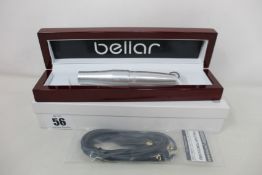 A MIcrobeau Bellar PMU permanent makeup machine with power cord.