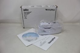 A boxed as new Welch Allyn Braun ThermoScan PRO 6000 ear thermometer with cradle.