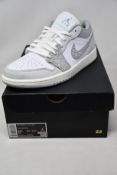 A pair of as new Nike Air Jordan 1 Low PRM (UK 8.5).