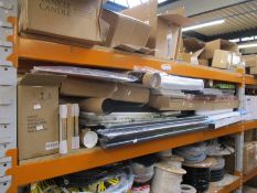 A large quantity of assorted prints, picture frames and related items.