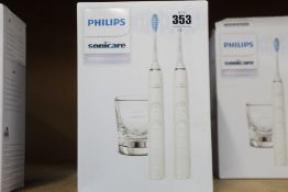 A boxed as new Philips Sonicare DiamondClean 9000 Set of 2 White Electric Toothbrushes.