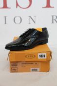 A pair of as new Tod's Bucatura Laser brogues (EU 39).