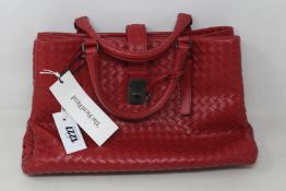 A pre-owned Bottega Veneta Intrecciato Handle bag in red (Excellent condition pre-owned retail price