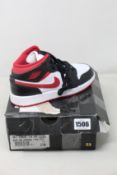 A pair of youths as new Nike Air Jordan 1 Mod (UK 4).
