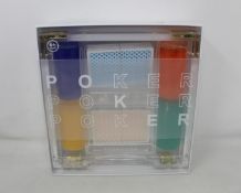 An as new Sunnylife Lucite acrylic poker set.