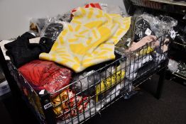 A quantity of as new clothing and related items.