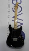 A Fender Player Lead II Electric Guitar with maple fingerboard in black (MNBLK).