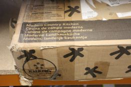 A Kidkraft modern country wooden play kitchen.