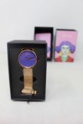 A women's as new Coluri Kahlo watch in violet (RRP £139).