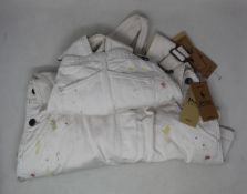 Three girls as new Ralph Lauren paint splattered denim dungarees (Ages 12, 14, 16).