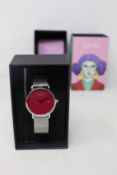 A women's as new Coluri Kahlo watch in scarlet (RRP £139).