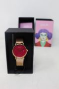 A women's as new Coluri Pankhurst watch in scarlet (RRP £139).