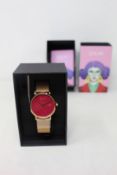A women's as new Coluri Pankhurst watch in scarlet (RRP £139).