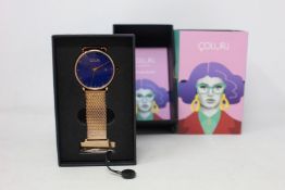 A women's as new Coluri Kahlo watch in navy (RRP £139).