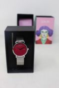 A women's as new Coluri Kahlo watch in scarlet (RRP £139).