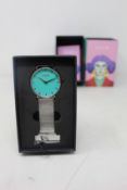 A women's as new Coluri Kahlo watch in turquoise (RRP £139).