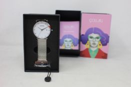 A women's as new Coluri Kahlo watch in snow (RRP £139).