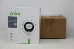 A boxed as new Mira Fertility Plus starter Kit EVA3000 (includes 1 digital analyser and ten test