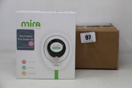 A boxed as new Mira Fertility Plus starter Kit EVA3000 (includes 1 digital analyser and ten test