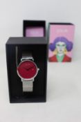 A women's as new Coluri Kahlo watch in scarlet (RRP £139).