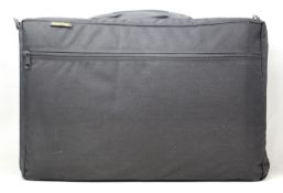 An as new Brass Bags Quad musical instrument case.