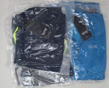 Two as new Gore Wear C3 sphere blue jerseys (Medium/small), two as new Gore Wear orbit blue 2 in 1