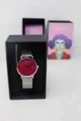 A women's as new Coluri Kahlo watch in scarlet (RRP £139).