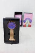 A women's as new Coluri Kahlo watch in violet (RRP £139).