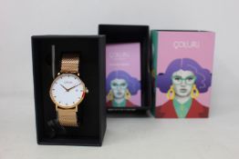 A women's as new Coluri Kahlo watch in snow (RRP £139).