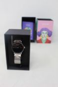 A women's as new Coluri Kahlo watch in black (RRP £139).